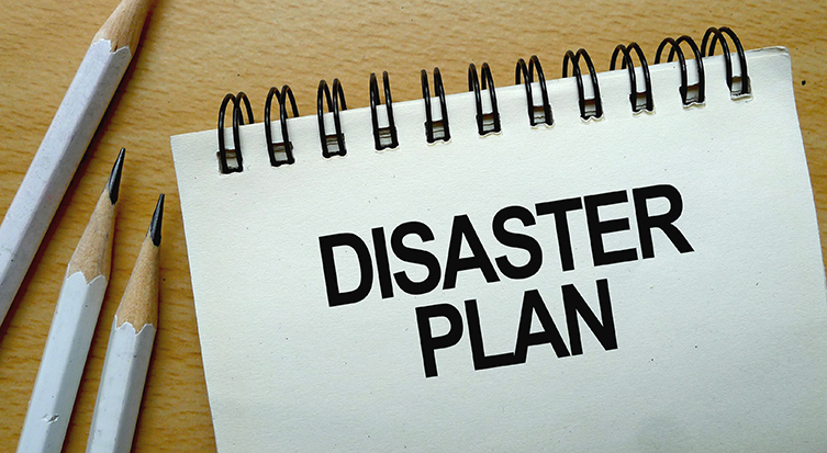 image of notepad with disaster plan written on it