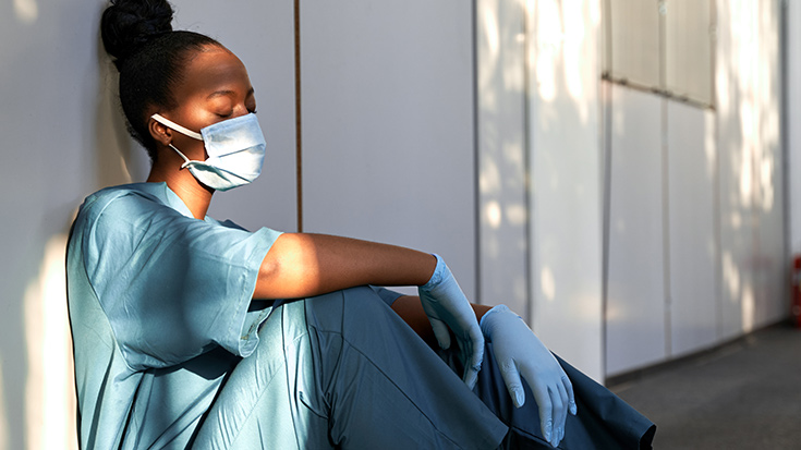 image of female health care working sitting on floor